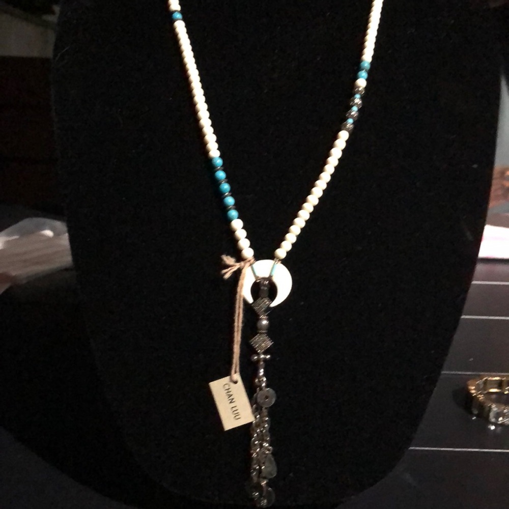 Turquoise , silver and ivory bead necklace